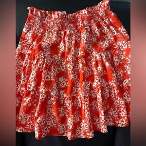 Orange floral  mini skirt size 4 brand new
